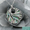 abalone necklace with swirls of diamonds