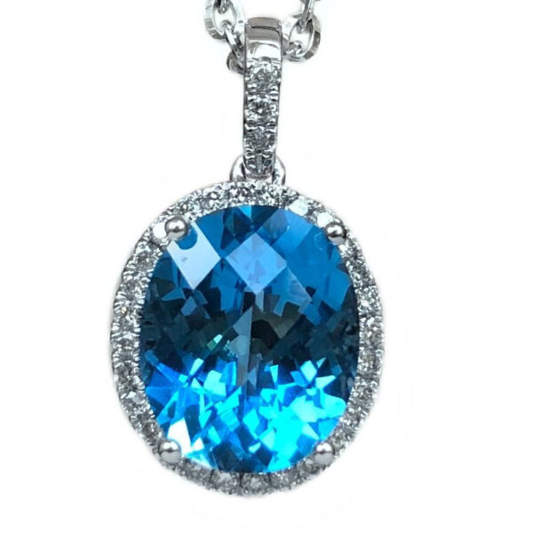 oval blue topaz & diamond halo pendant