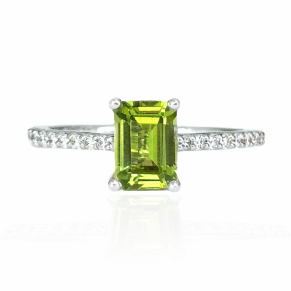 25805 14kt white gold emerald cut peridot 1.08ct & diamond .19ctw ring